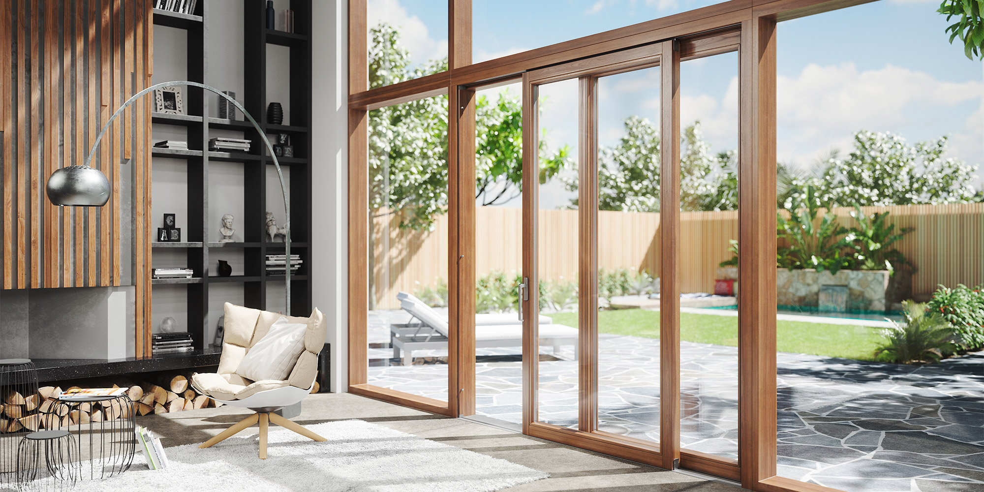 Moderner Wohnraum mit großer Hebeschiebetür aus Holz und Gartenblick